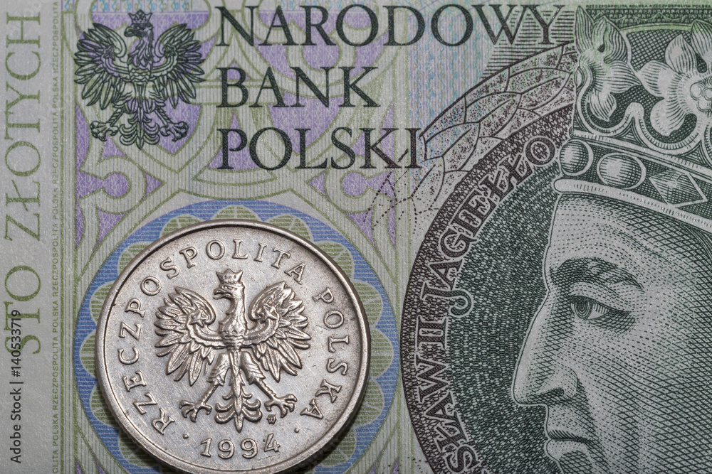 Polish one hundred zloty bill and coin macro