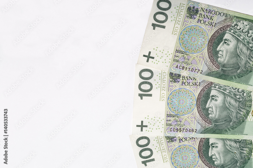 Polish zloty banknotes on white paper background closeup. Polish zloty banknotes on white paper background closeup.