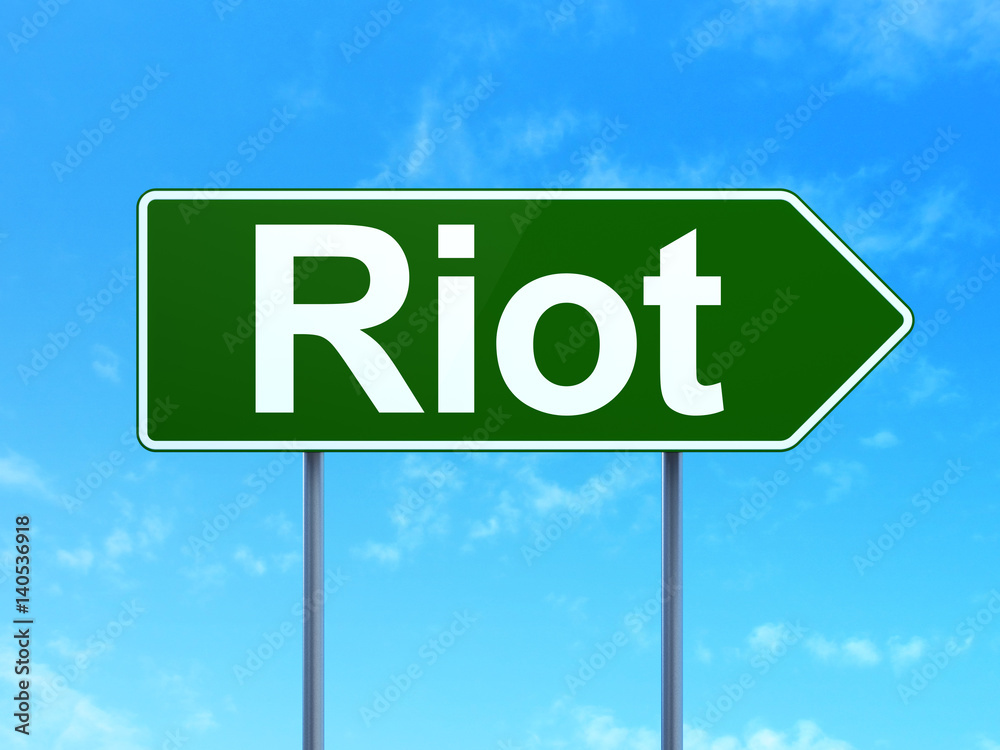 Political concept: Riot on road sign background Political concept: Riot on road sign background