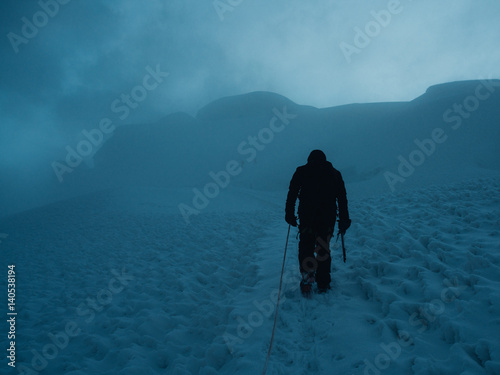 Climber going up Pisco Mountain photo