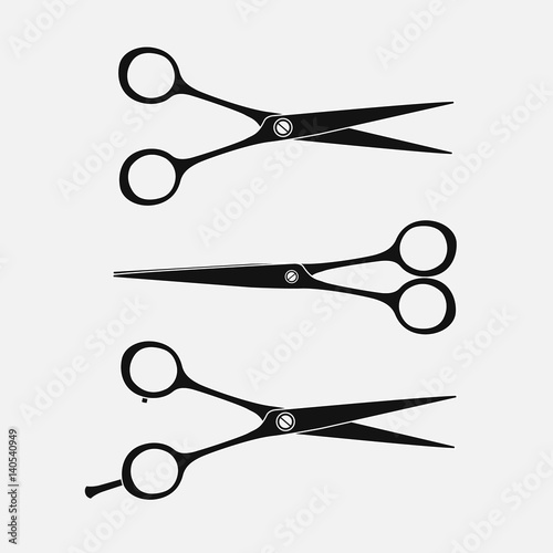 set of hairdressing scissors. Silhouettes of scissors. Vector