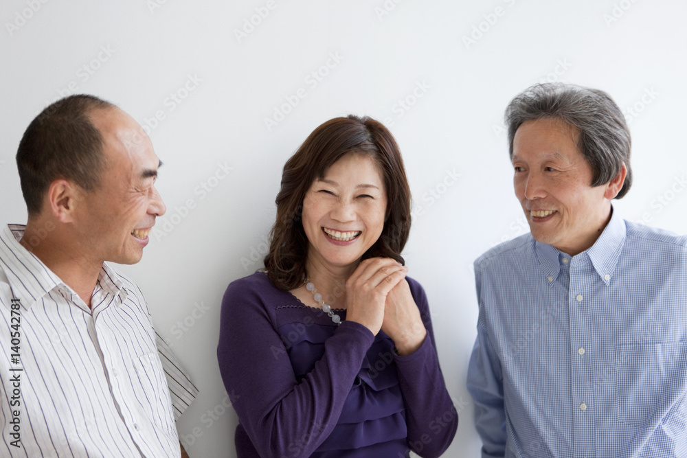 Portrait of Two Mature Men and Woman