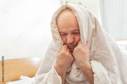 Photography Sad elderly man suffers from insomnia