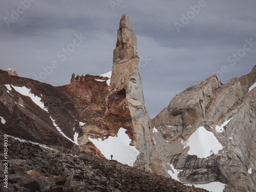 Man near a rock gendarme photo