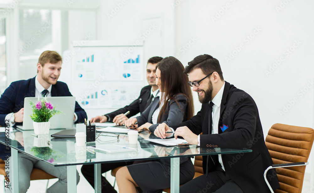 business team prepares the presentation of a new financial project on a workplace business team prepares the presentation of a new financial project on a workplace