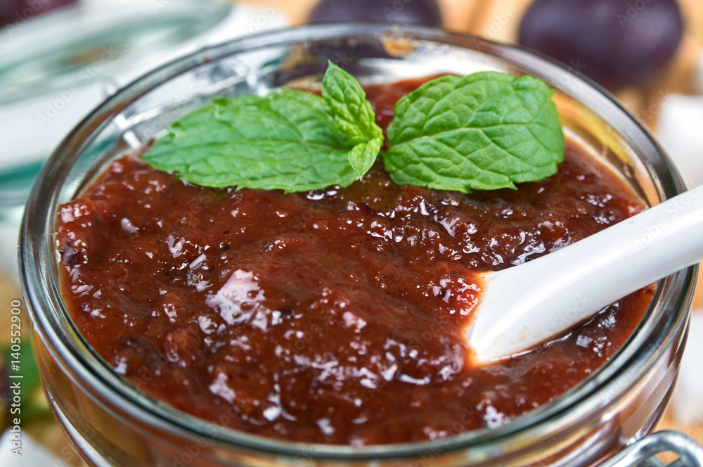 Plum jam in a jar. Homemade fruit jam Plum jam in a jar. Homemade fruit jam