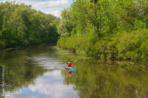 Man on the river training in kayaking. Sport
