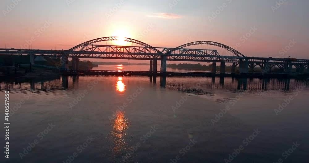 Aerial. A bridge at sunset.