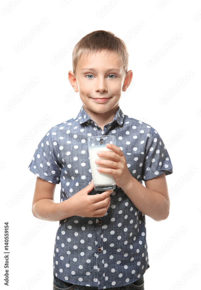 Smiling little boy holding glass of milk isolated on white Smiling little boy holding glass of milk isolated on white