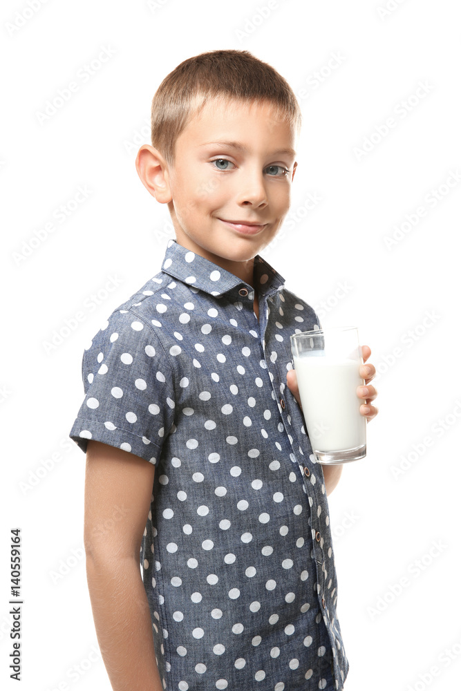 Smiling little boy holding glass of milk isolated on white Smiling little boy holding glass of milk isolated on white