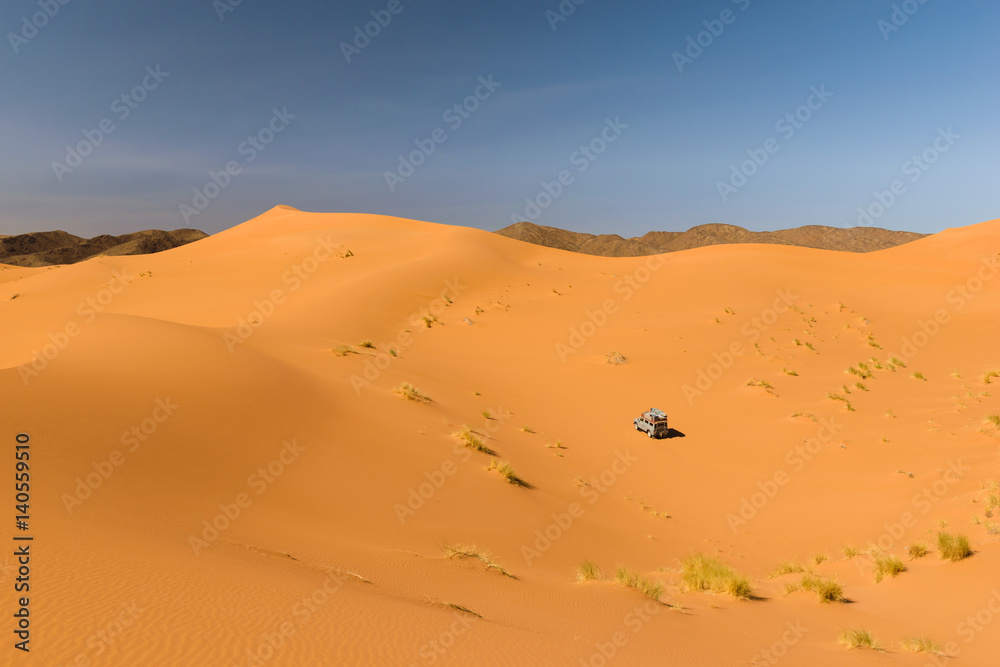 Safari car in the desert, Ouzina, Morocco