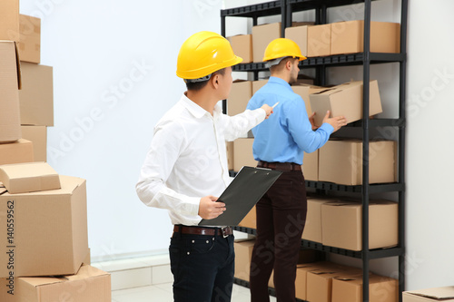 Managers checking orders at...