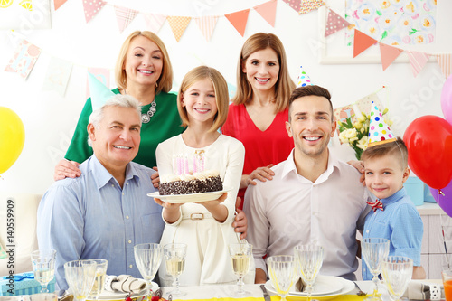 Family celebrating birthday...