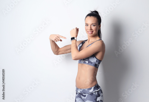 Sporty young woman with fit...