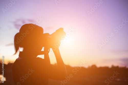 Woman holding a camera 