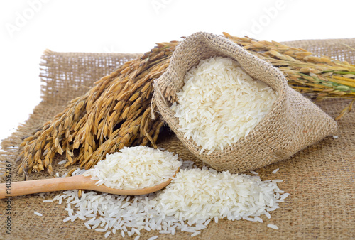 white rice (Thai Jasmine rice) and unmilled rice isolated on white background