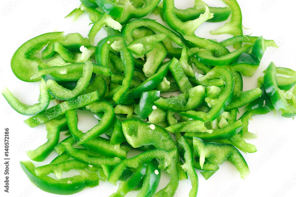 fresh chopped green pepper for salad isolated on white background fresh chopped green pepper for salad isolated on white background