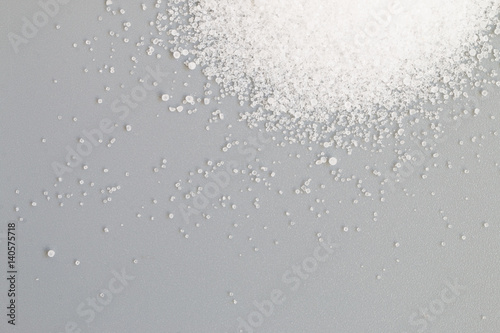 Salt on gray background