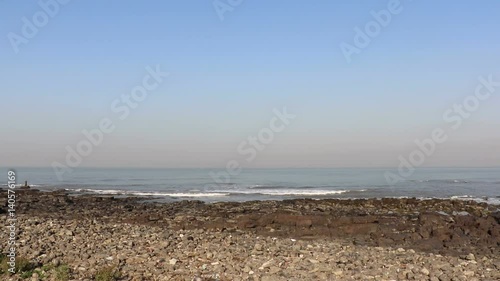 Worli sea face beach in South Mumbai is famous for waves lashing and spraying water out on onlookers. Now another landmark is Sea link bridge joining worli to bandra. photo