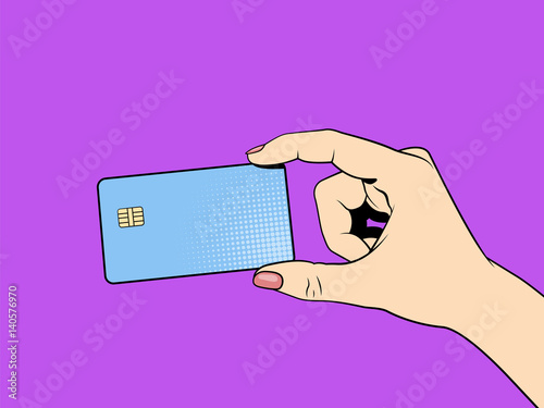 Credit card in hand. Pop art illustration