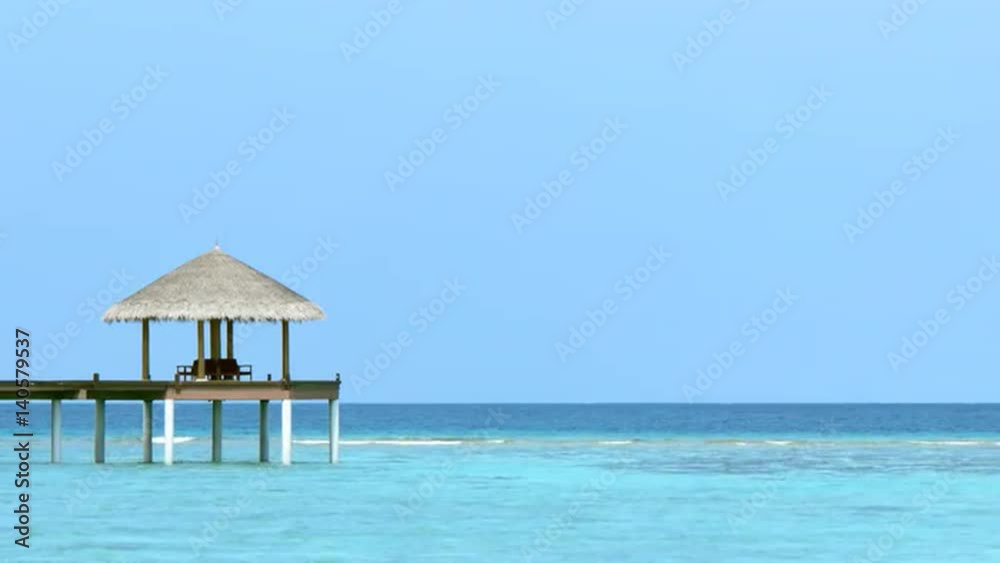 Sun Shelter on the End of a Pier at a Resort in the Maldives