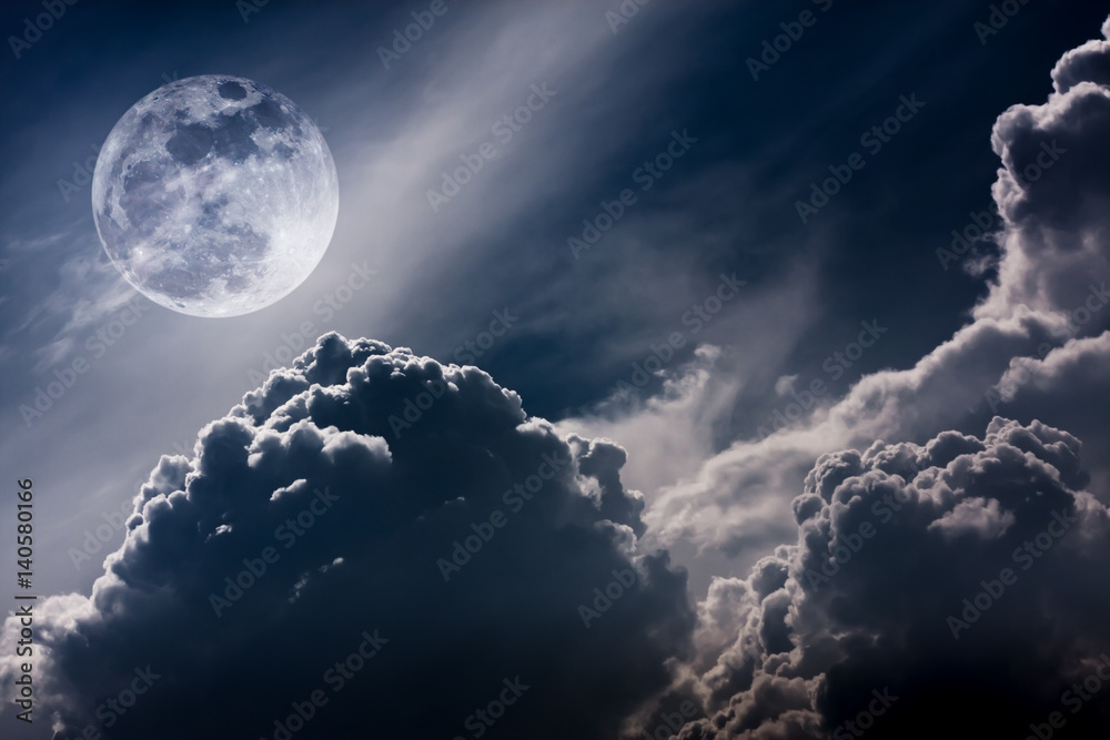 Fototapeta premium Nighttime sky with clouds and bright full moon with shiny. Vintage tone effect.