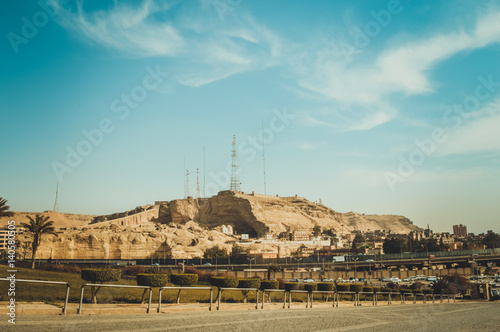 mountain behind road with view of sky at cairo, egypt