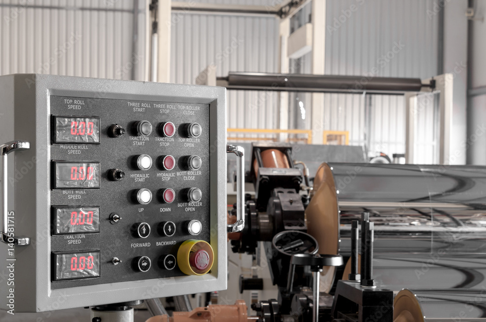 the control panel at the plant for the production of cellophane and polypropylene closeup. the dashboard in the workshop on the production the control panel at the plant for the production of cellophane and polypropylene closeup. the dashboard in the workshop on the production