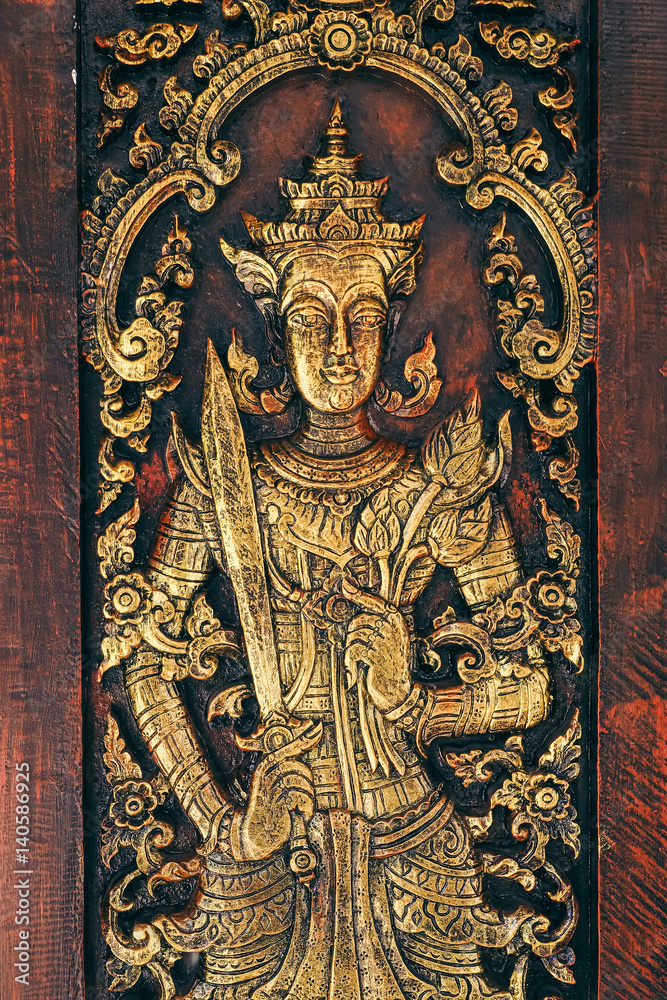 Thai Wooden Sculpture Male Angle On Temple Door