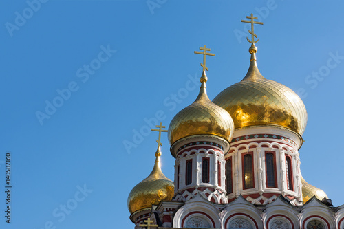 Golden domes of Rozhdestvo Hristovo memorial russian church in Shipka, Bulgaria photo