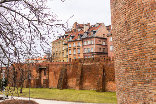 The area of the Old Town in Warsaw, Poland . The city's medieval wall and old houses.