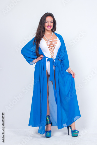 Pretty woman posing in bathrobe
