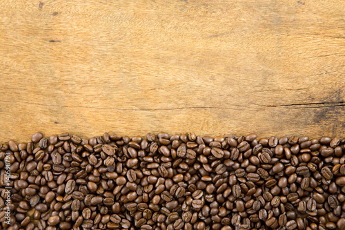Coffee beans on wood background © NVB Stocker