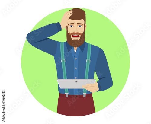 Hipster holding digital tablet PC and grabbed his head
