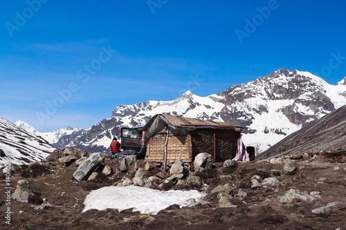 Little House And Jeep Snow Mountain Background Morning with Blue Sky in Zero Point Sikkim India