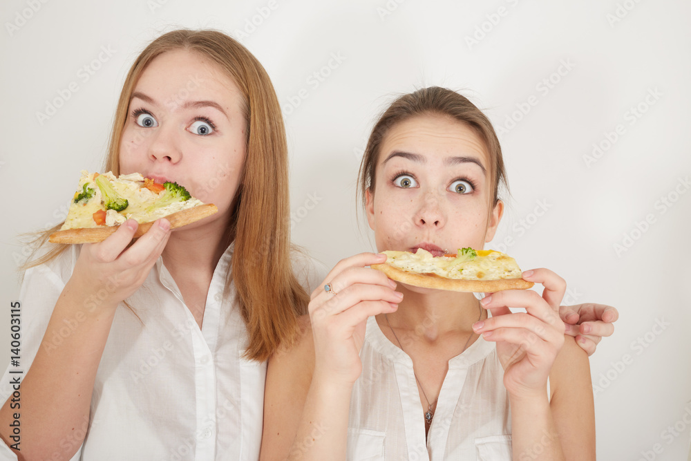 happy girls eats pizza on white background
