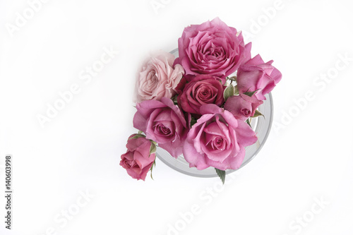 Bouquet of natural roses on white background.