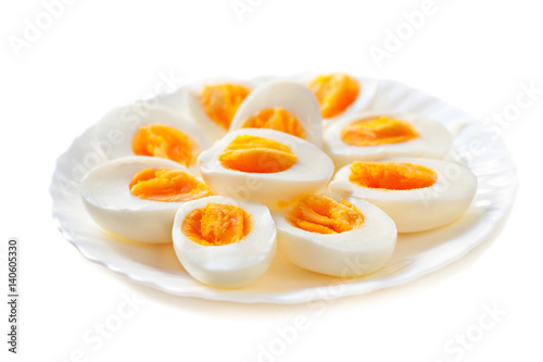 Halved Eggs isolated on white  background closeup