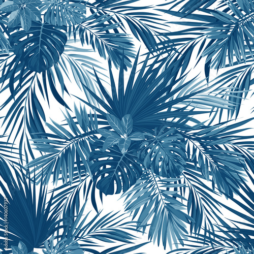Tropical background with jungle plants. Vector seamless tropical pattern with indigo blue phoenix palm leaves.