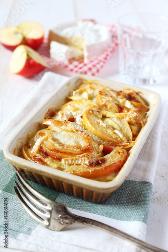 Gratin of potatoes, apples and  Camembert cheese