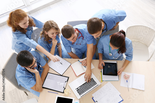 Medical students studying a...