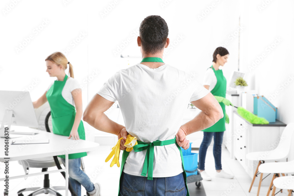 Fototapeta premium Service team cleaning modern office