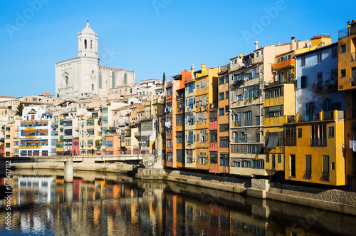  picturesque houses and church on river Onyar  in Gerona © JackF