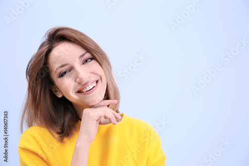Young beautiful woman on li...
