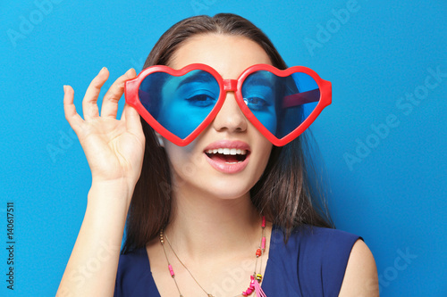 Beautiful young woman with ...