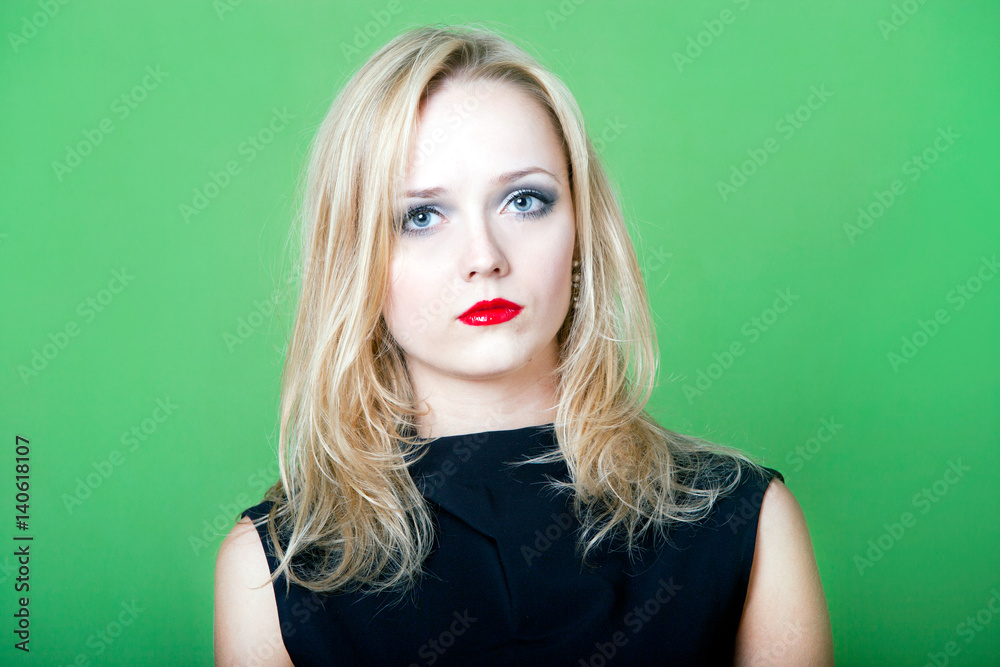 Blonde woman on green background Blonde woman on green background
