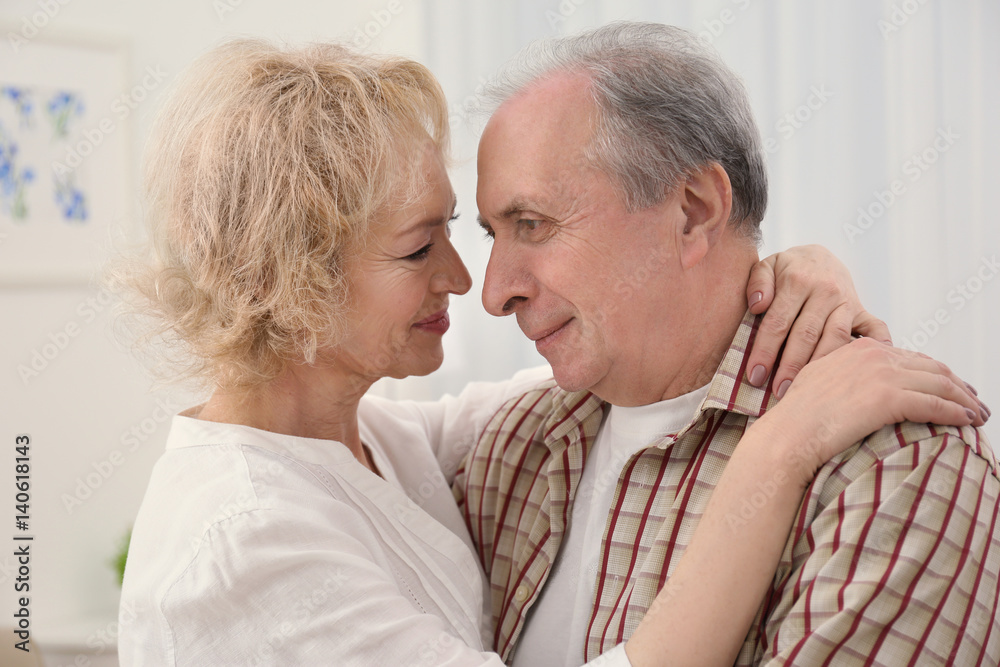 Closeup portrait of happy senior couple at home Closeup portrait of happy senior couple at home
