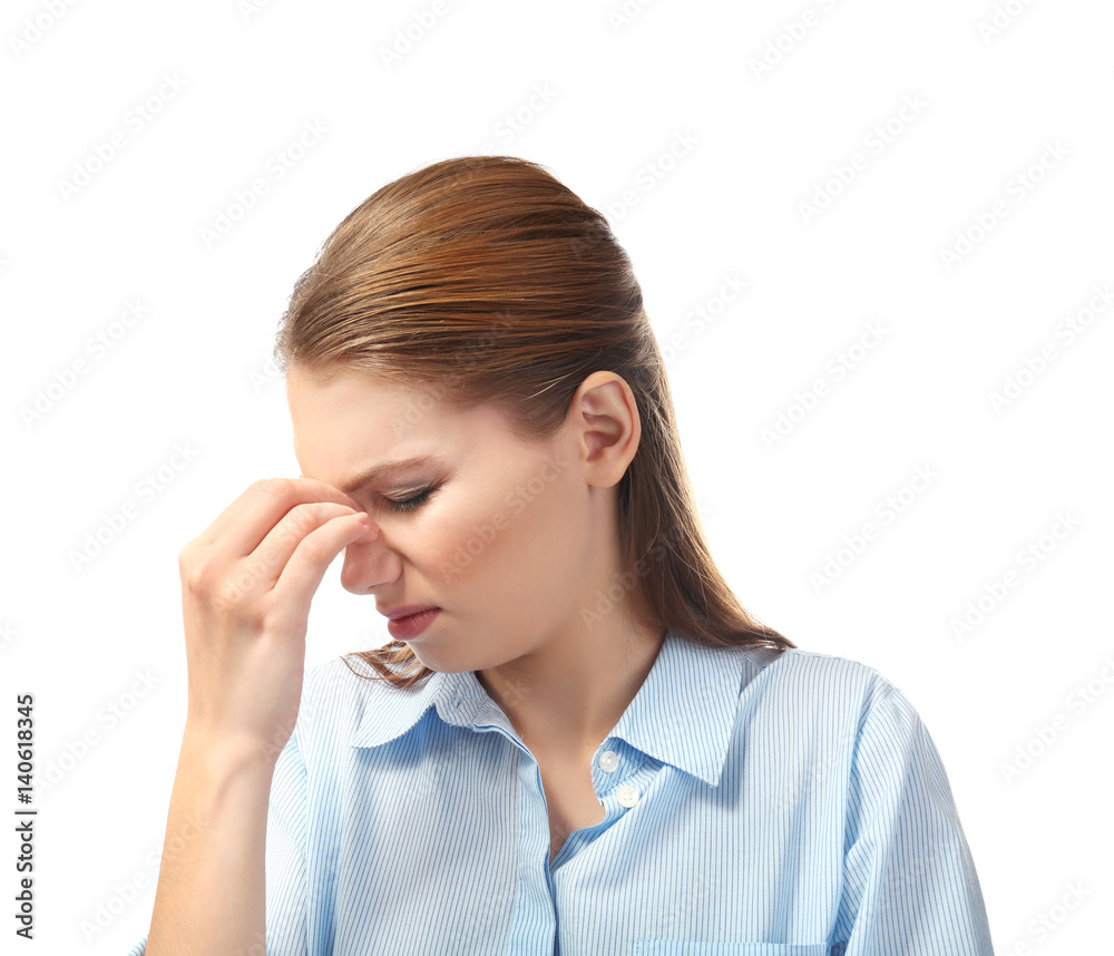 Beautiful young woman suffering from headache on white background Beautiful young woman suffering from headache on white background