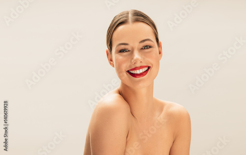 Happy young woman with beautiful skin