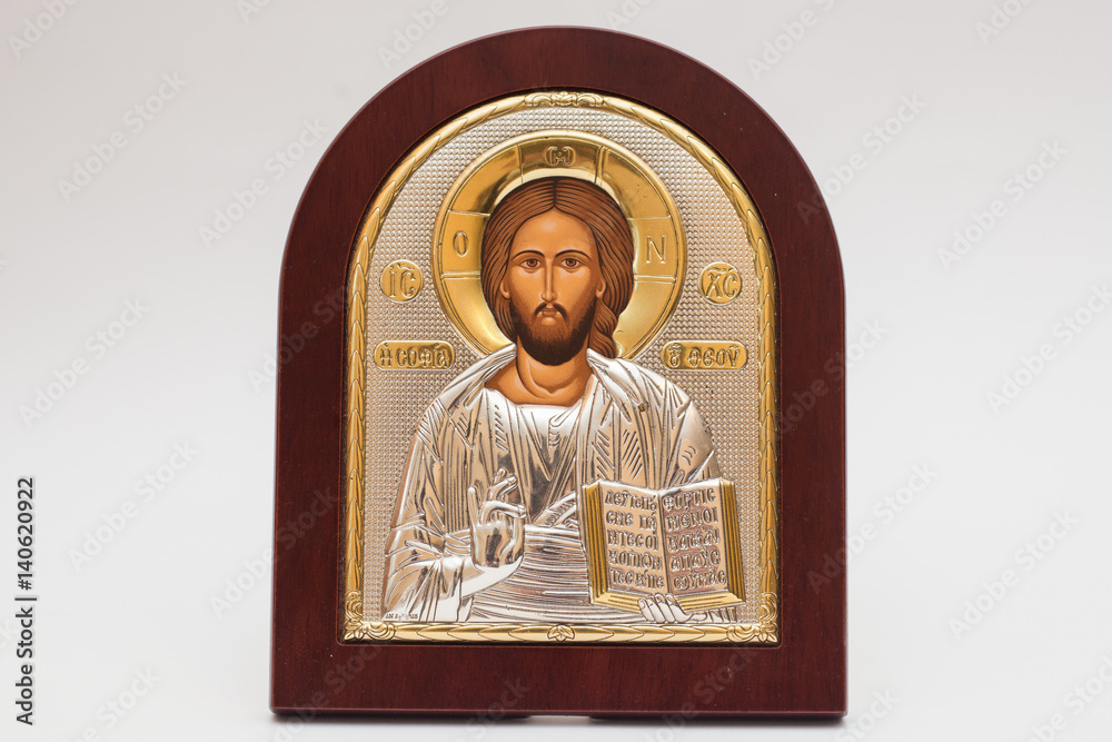 Fototapeta premium Church icon Silver icon of Jesus with gold inserts